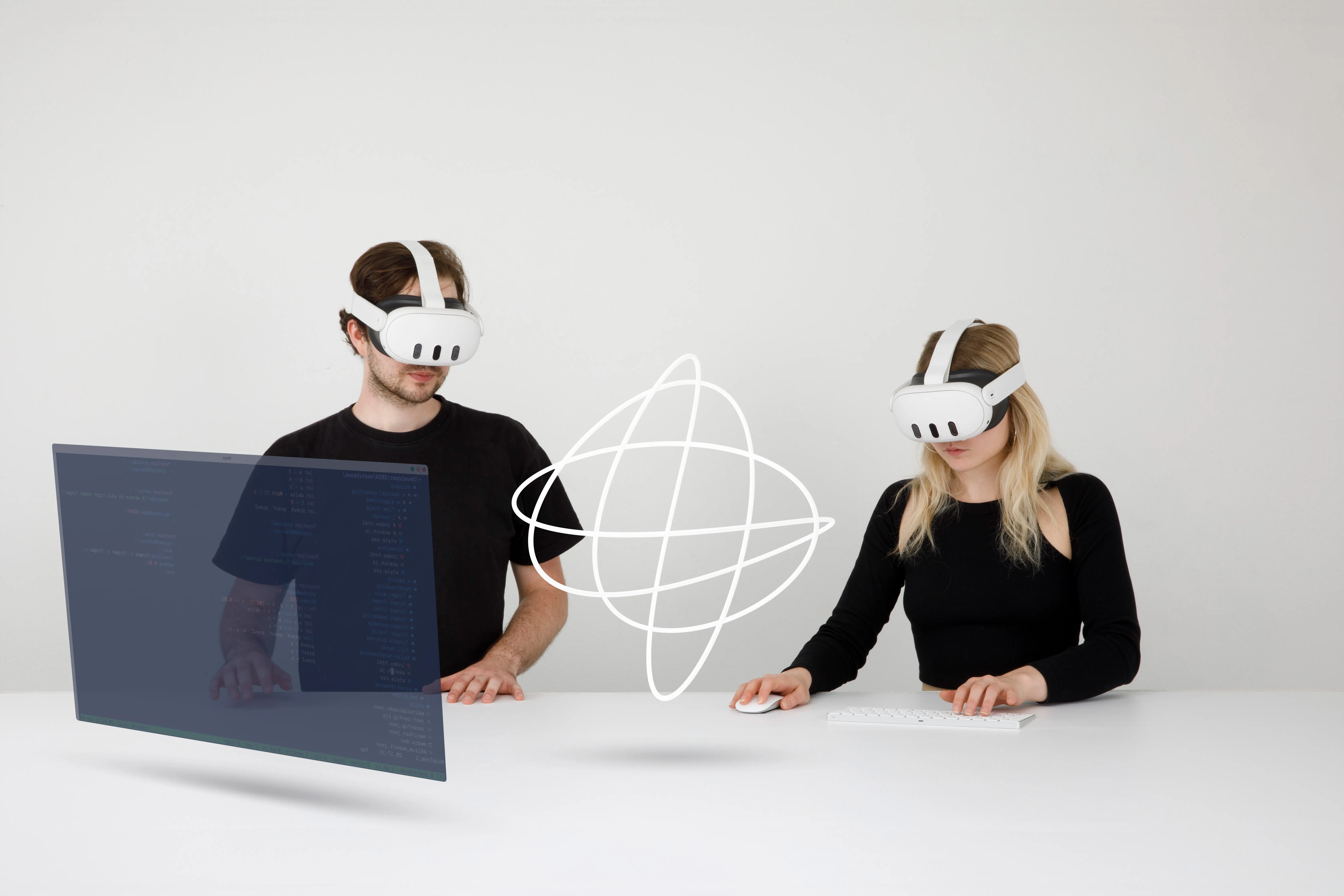 A blonde woman and brunette man looking at a white geometric shape through white mixed reality headsets.